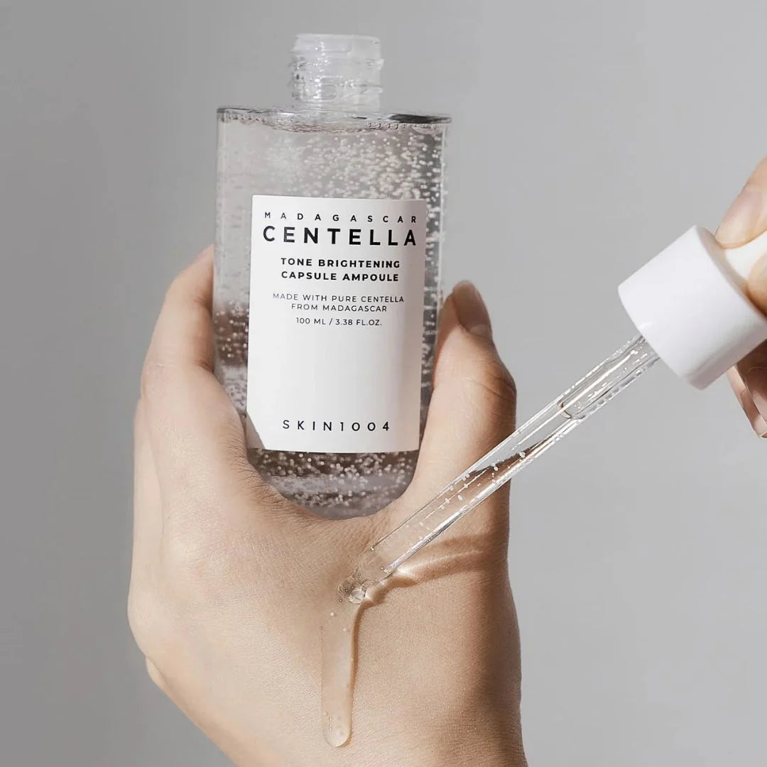 Indulge in the luxurious benefits of Madagascar Centella Tone Brightening Capsule Ampoule, a potent blend of botanical extracts and antioxidants that work synergistically to rejuvenate and illuminate the complexion